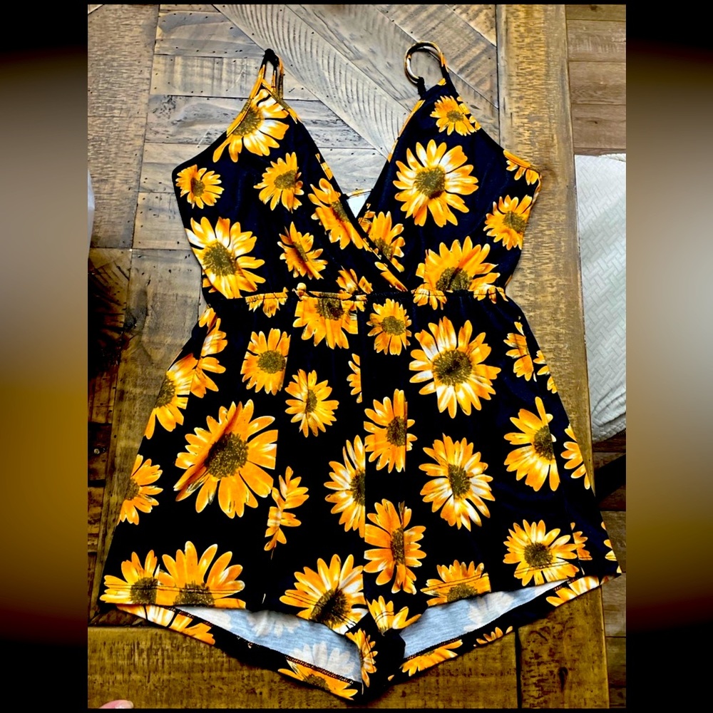 Spring/Summer sunflower romper. Very good condition. Smoke free home.
